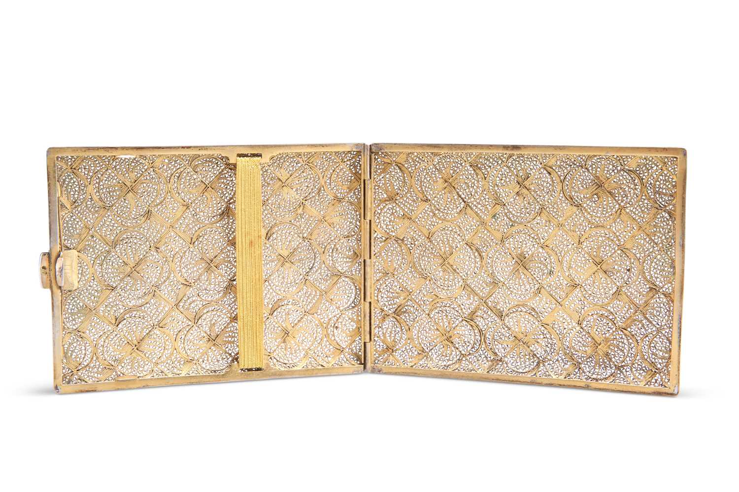 A CONTINENTAL FILIGREE SILVER-GILT CIGARETTE CASE