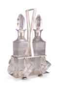 AN EDWARDIAN SILVER AND SILVER-PLATED DRINKS SET