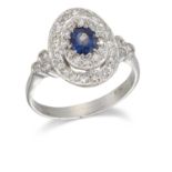 A SAPPHIRE AND DIAMOND CLUSTER RING