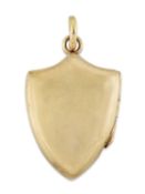 A SHIELD-SHAPED LOCKET PENDANT