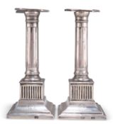 A RARE PAIR OF MEXICAN CAST SILVER CANDLESTICKS, CIRCA 1800-1810