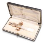 A LATE VICTORIAN 9 CARAT GOLD AND MOTHER-OF-PEARL BABY'S RATTLE AND WHISTLE