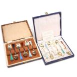 TWO CASED SETS OF SIX SCANDINAVIAN SILVER GILT AND HARLEQUIN ENAMEL COFFEE SPOONS