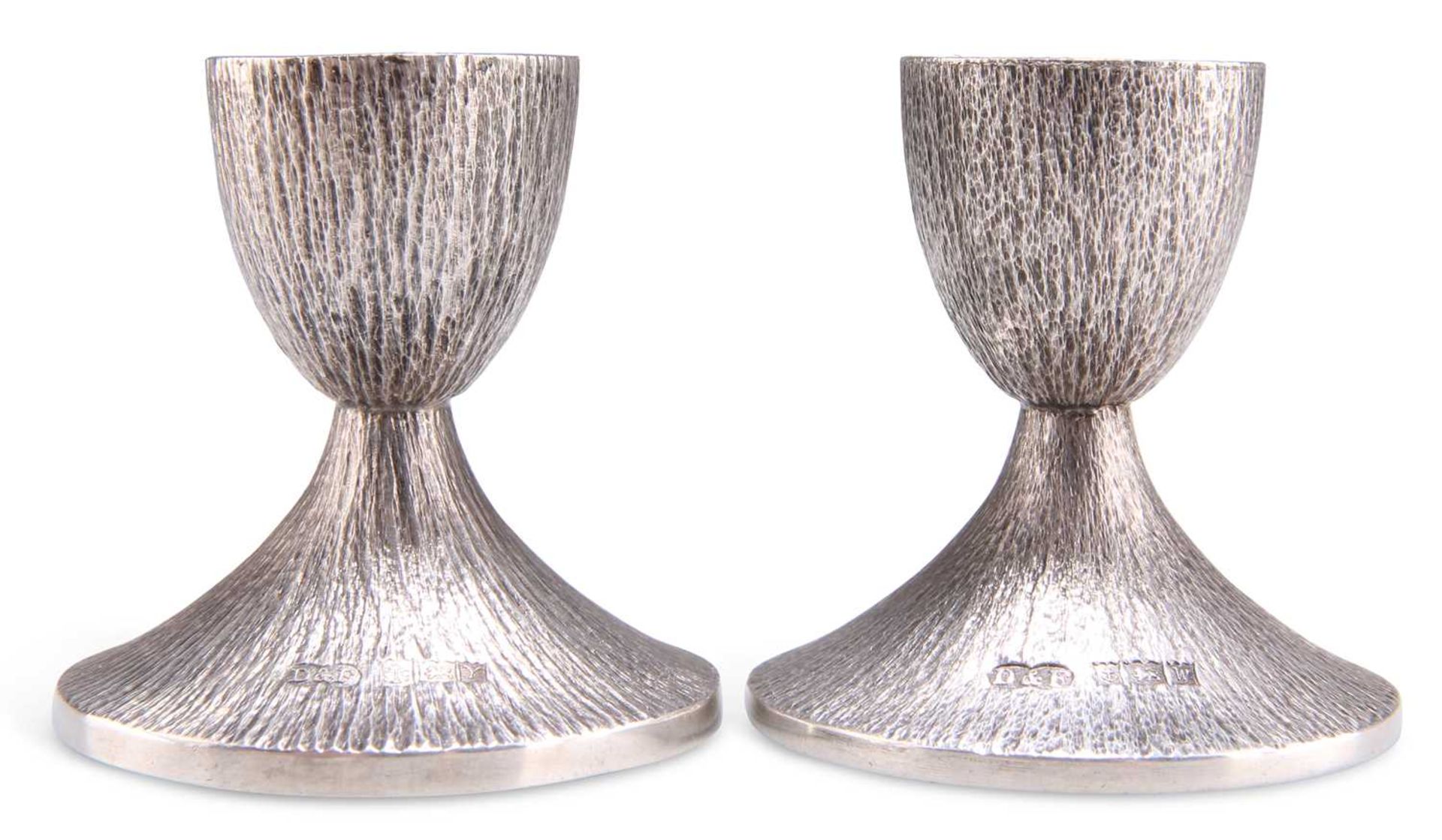 A PAIR OF ELIZABETH II SILVER CANDLESTICKS