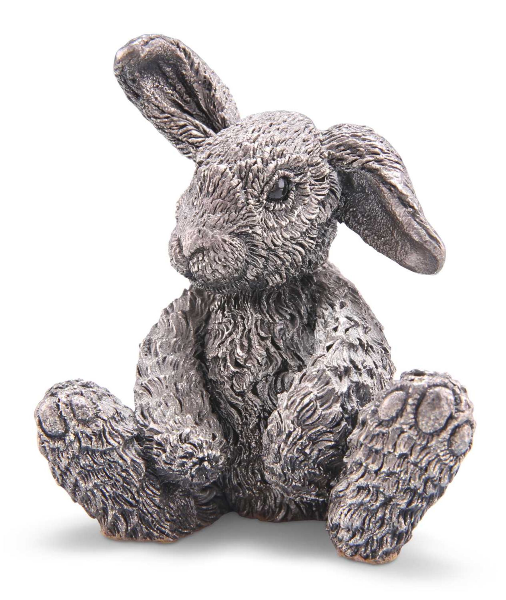 A SILVER FILLED MODEL OF A TOY RABBIT