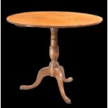 A GEORGE III MAHOGANY-CROSSBANDED OAK TILT-TOP TRIPOD TABLE