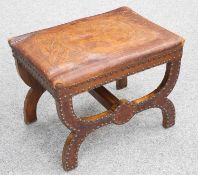 A STAMPED LEATHER STOOL