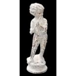 A CAST IRON FIGURE OF A BOY PLAYING A FLUTE