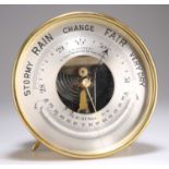 AN EARLY 20TH CENTURY BRASS DESK-TOP BAROMETER