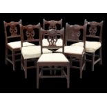 A SET OF SIX GEORGE III MAHOGANY DINING CHAIRS