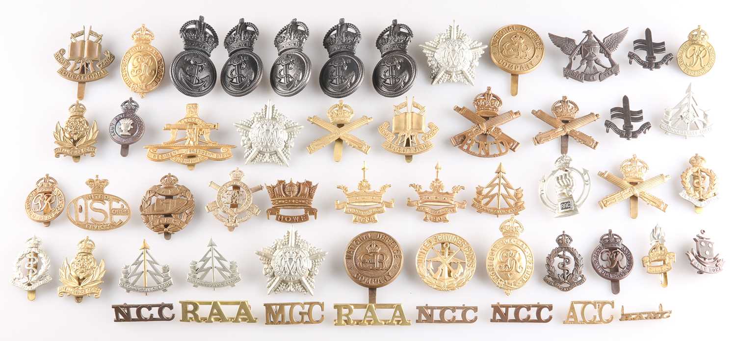 ASSORTED CAP BADGES AND SHOULDER TITLES OF VARIOUS CORPS