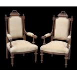 A PAIR OF VICTORIAN WALNUT ARMCHAIRS