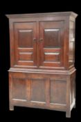 A JOINED OAK LIVERY CUPBOARD, EARLY 18TH CENTURY