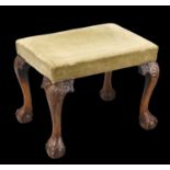 A GEORGE II STYLE WALNUT STOOL