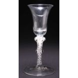 AN 18TH CENTURY OPAQUE AIR TWIST COMPOSITE STEM WINE GLASS