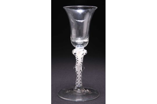 AN 18TH CENTURY OPAQUE AIR TWIST COMPOSITE STEM WINE GLASS