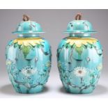 A PAIR OF CHINESE FAHUA VASES AND COVERS, 19TH CENTURY