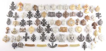 A COLLECTION OF CAP BADGES
