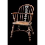 A 19TH CENTURY YEW AND ELM CHILD'S WINDSOR CHAIR