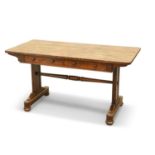 A REGENCY ROSEWOOD PILLAR-END LIBRARY TABLE