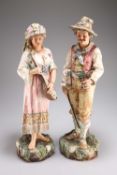 A LARGE PAIR OF EARLY 20TH CENTURY AUSTRIAN POTTERY FIGURES