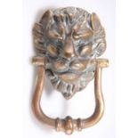 A LARGE VICTORIAN BRASS DOOR KNOCKER