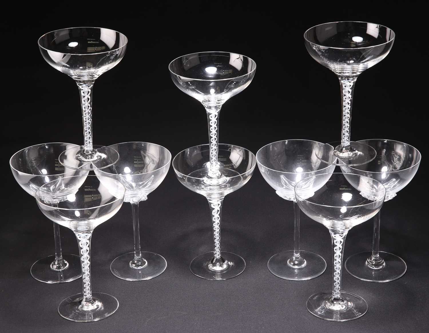 A GROUP OF CHAMPAGNE GLASSES