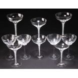 A GROUP OF CHAMPAGNE GLASSES