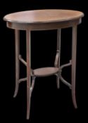 AN EDWARDIAN STRING-INLAID MAHOGANY OVAL OCCASIONAL TABLE