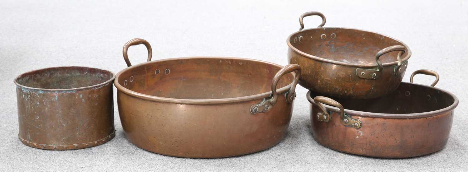 THREE ANTIQUE COPPER ROLL-TOP PANS AND A RIVETED COPPER PLANTER