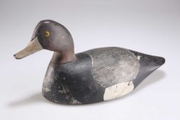 A CARVED AND PAINTED WOODEN DECOY DUCK
