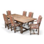 ROYAL OAK FURNITURE COMPANY, A PERIOD-STYLE OAK REFECTORY DINING TABLE AND EIGHT CHAIRS