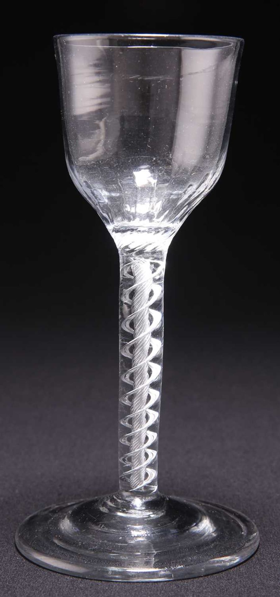 AN 18TH CENTURY AIR TWIST WINE GLASS