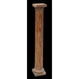 A 19TH CENTURY PINE TORCHERE