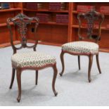 A PAIR OF LATE VICTORIAN WALNUT PARLOUR CHAIRS