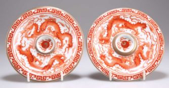 A PAIR OF CHINESE IRON-RED 'DRAGON' SAUCERS