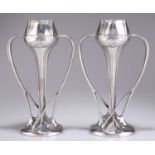 ARCHIBALD KNOX (1864-1933) FOR LIBERTY & CO, A PAIR OF TUDRIC PEWTER TULIP VASES