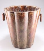 A 19TH CENTURY TOOLED LEATHER FIRE BUCKET