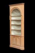 A GEORGE III STYLE PINE ALCOVE CABINET