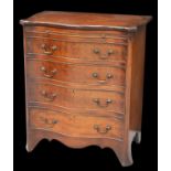 A GEORGE III STYLE MAHOGANY SERPENTINE CHEST OF DRAWERS