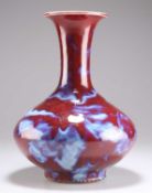 A CHINESE SANG DE BOEUF VASE