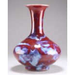 A CHINESE SANG DE BOEUF VASE