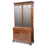 A GEORGE III STYLE INLAID MAHOGANY BOOKCASE CABINET