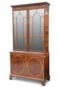 A GEORGE III STYLE INLAID MAHOGANY BOOKCASE CABINET