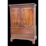 A GEORGE III MAHOGANY GENTLEMAN'S PRESS CUPBOARD