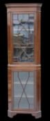 AN EDWARDIAN STRING-INLAID MAHOGANY FLOOR-STANDING CABINET