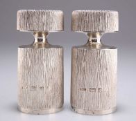 A PAIR OF ELIZABETH II SILVER SALT AND PEPPER MILLS