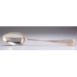 AN EDWARDIAN SILVER BASTING SPOON