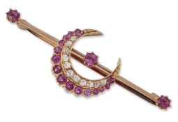 A LATE 19TH CENTURY RUBY AND DIAMOND CRESCENT BROOCH