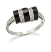 AN ONYX AND DIAMOND RING
